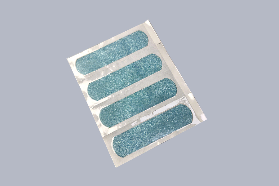 Tirita decorativa con purpurina de 7 cm × 2 cm.